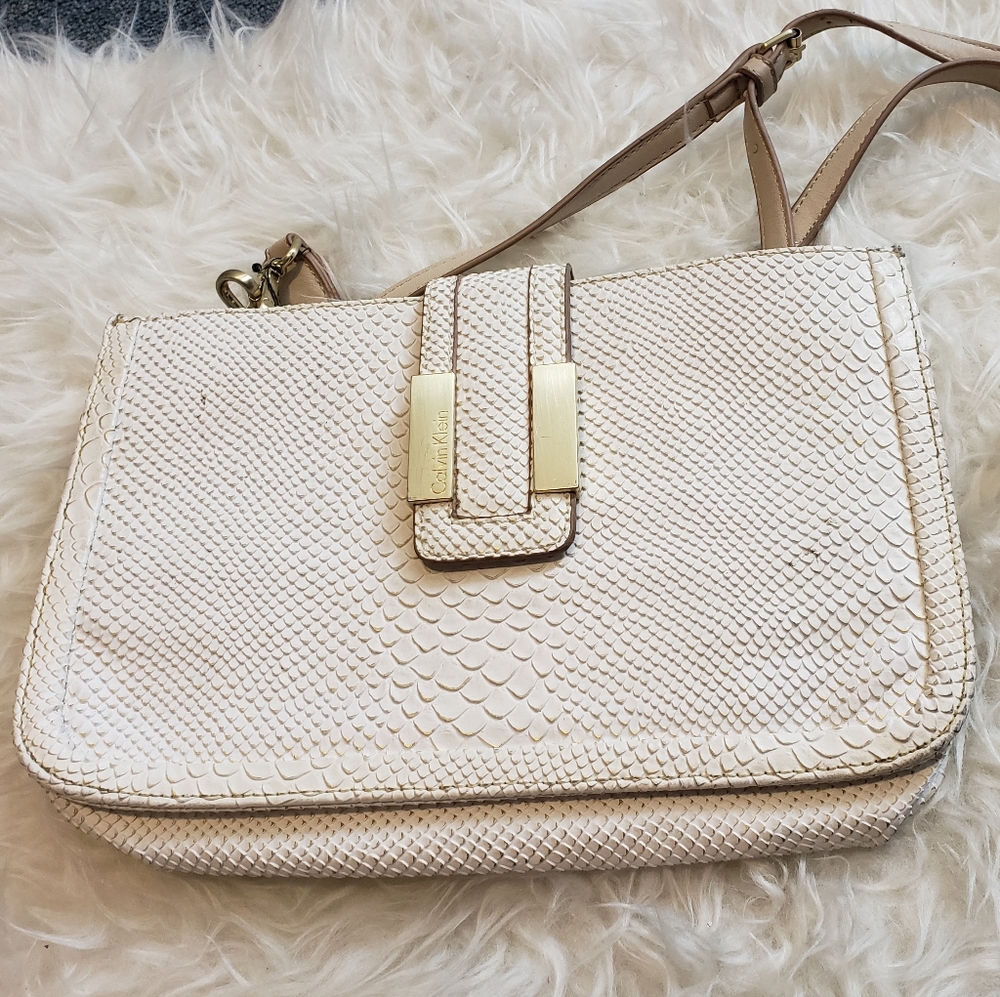 Calvin Klein White Crossbody purse with golden buckle and shoulder strap
